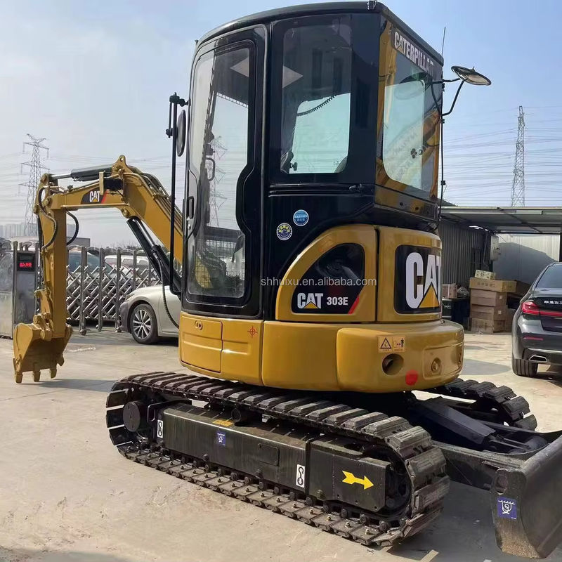 Gelbfarbiger Mini-Gebrauchsgraber Cat303e zum Verkauf